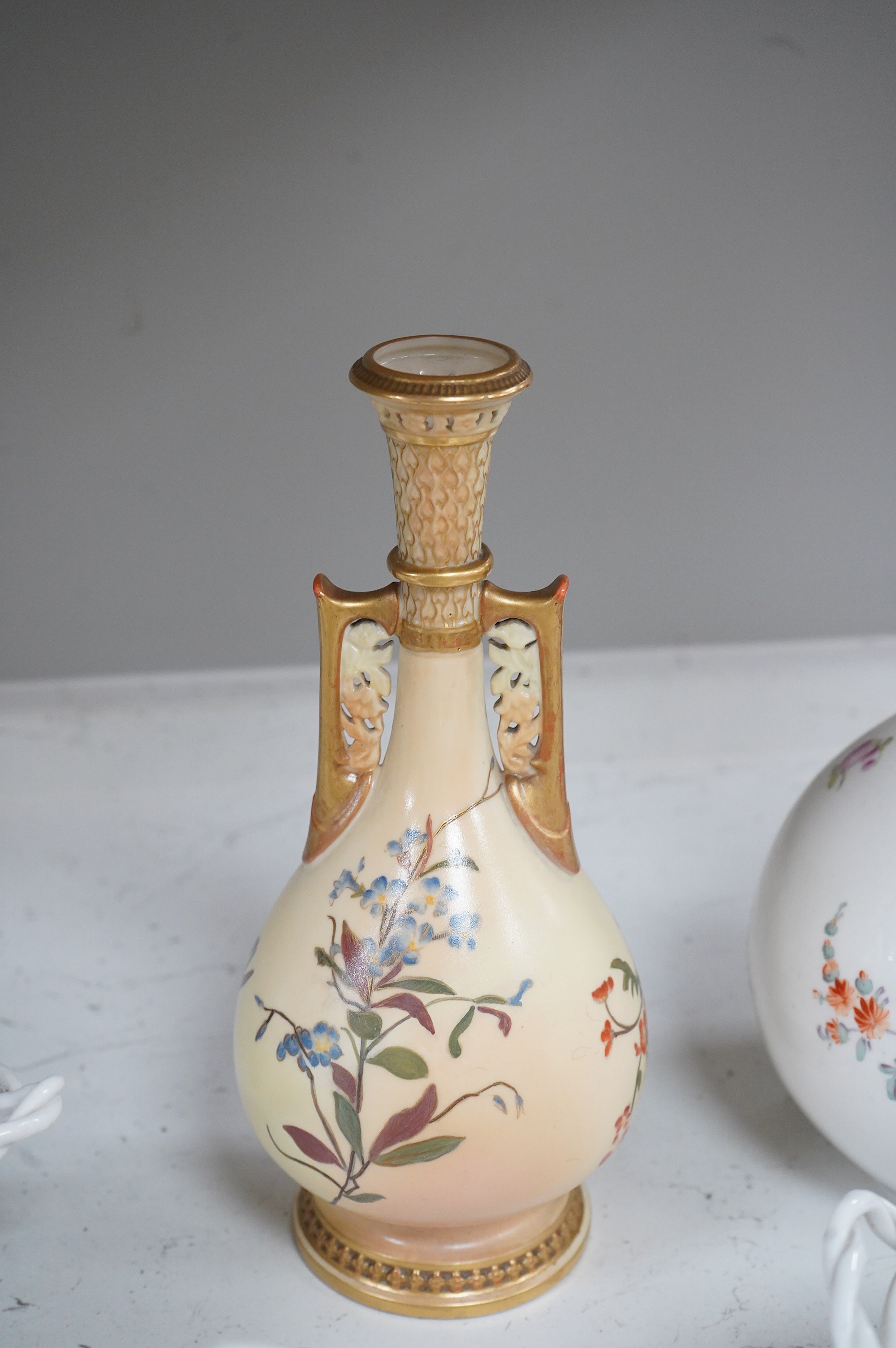A 19th century Derby tureen and cover, a pair of Royal Worcester blush vase-26cm high, a Belleek basket and cover, a Wedgwood blue Jasperware cheese dish and associated cover, two continental baskets and vase. (7).